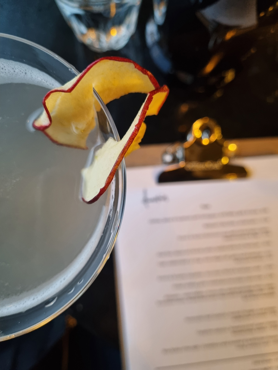 Image: Kia Dirkson A cocktail and menu at Downstairs